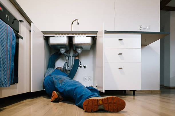 Professional Plumbing technician working in Newington, VA